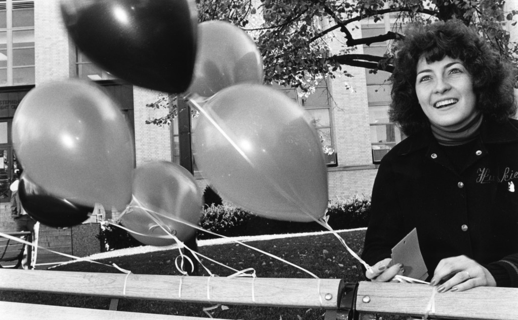 Student Anne McDonald sells balloons to raise funds for physical therapy club, November 1987