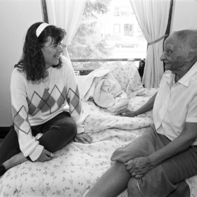 Senior physical therapy student Beth-Ann Towsley visits senior citizen, 1993.